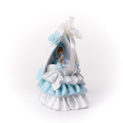 Figurine bebe bleu dans berceau 10 cm seul